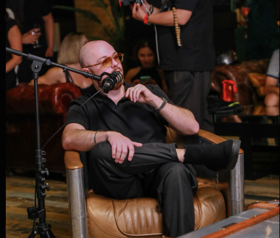 Dylan Madden speaking during a podcast interview